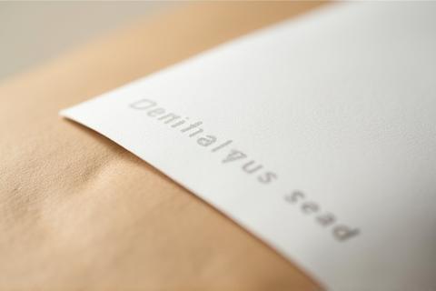 Close-up photo highlighting the detail and texture of minimalist product packaging
